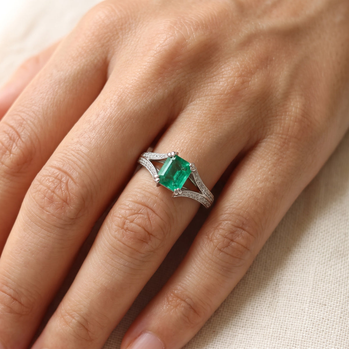 Emerald-Cut Emerald Split-Shank Ring in White Gold, worn