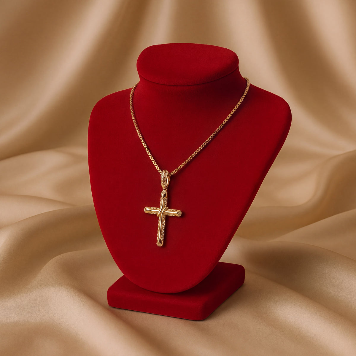 Textured yellow gold cross pendant on a box chain