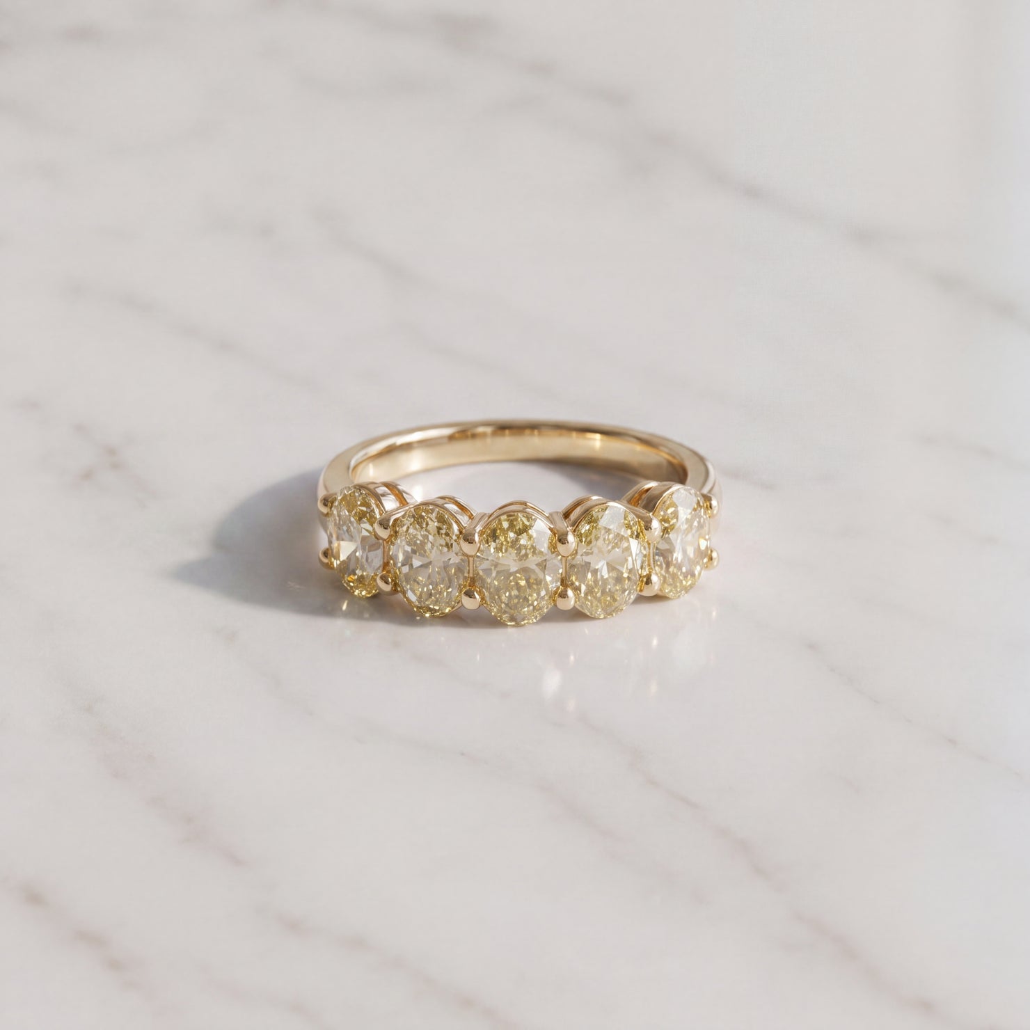 Fancy Yellow Oval Diamond Five-Stone Ring in Yellow Gold