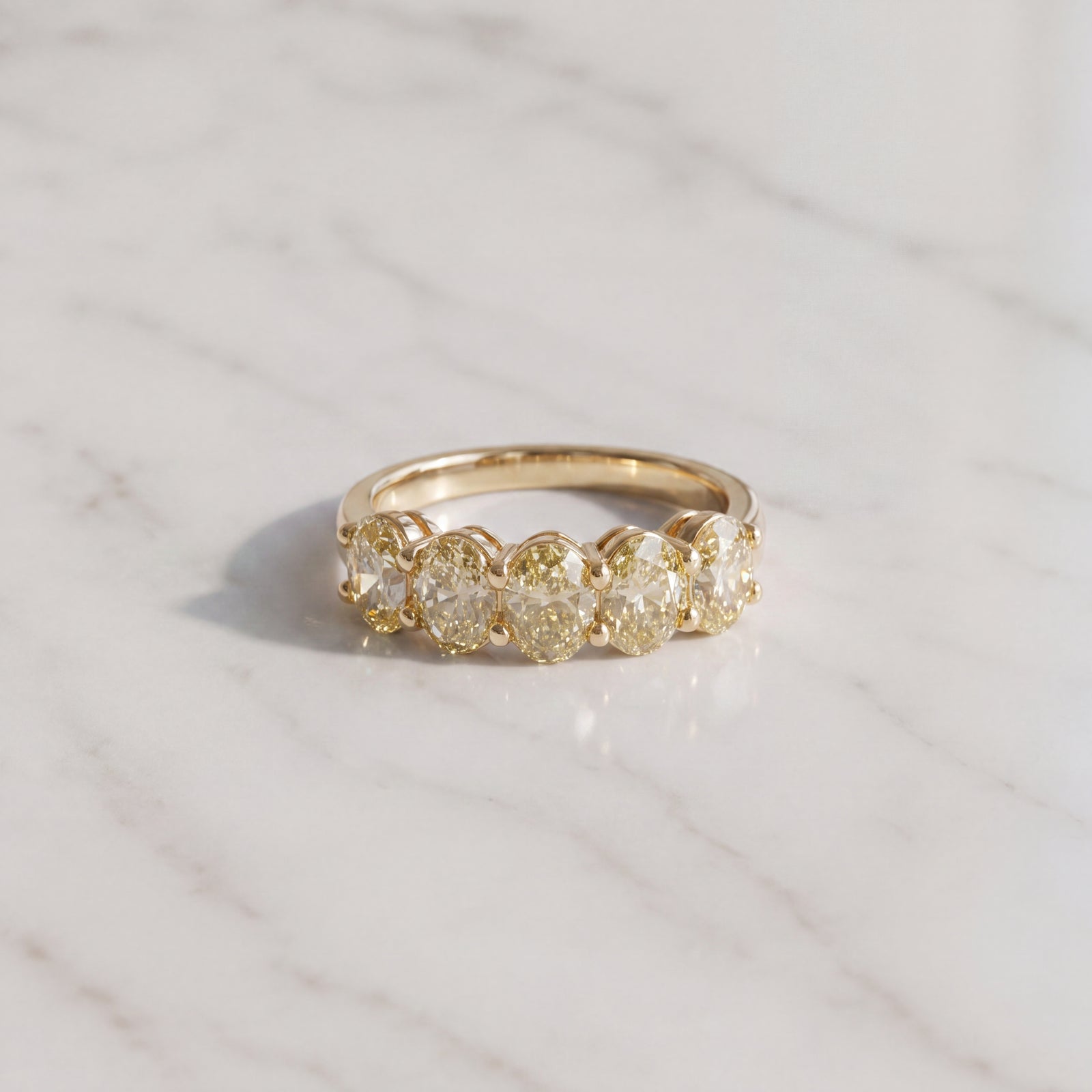 Fancy Yellow Oval Diamond Five-Stone Ring in Yellow Gold