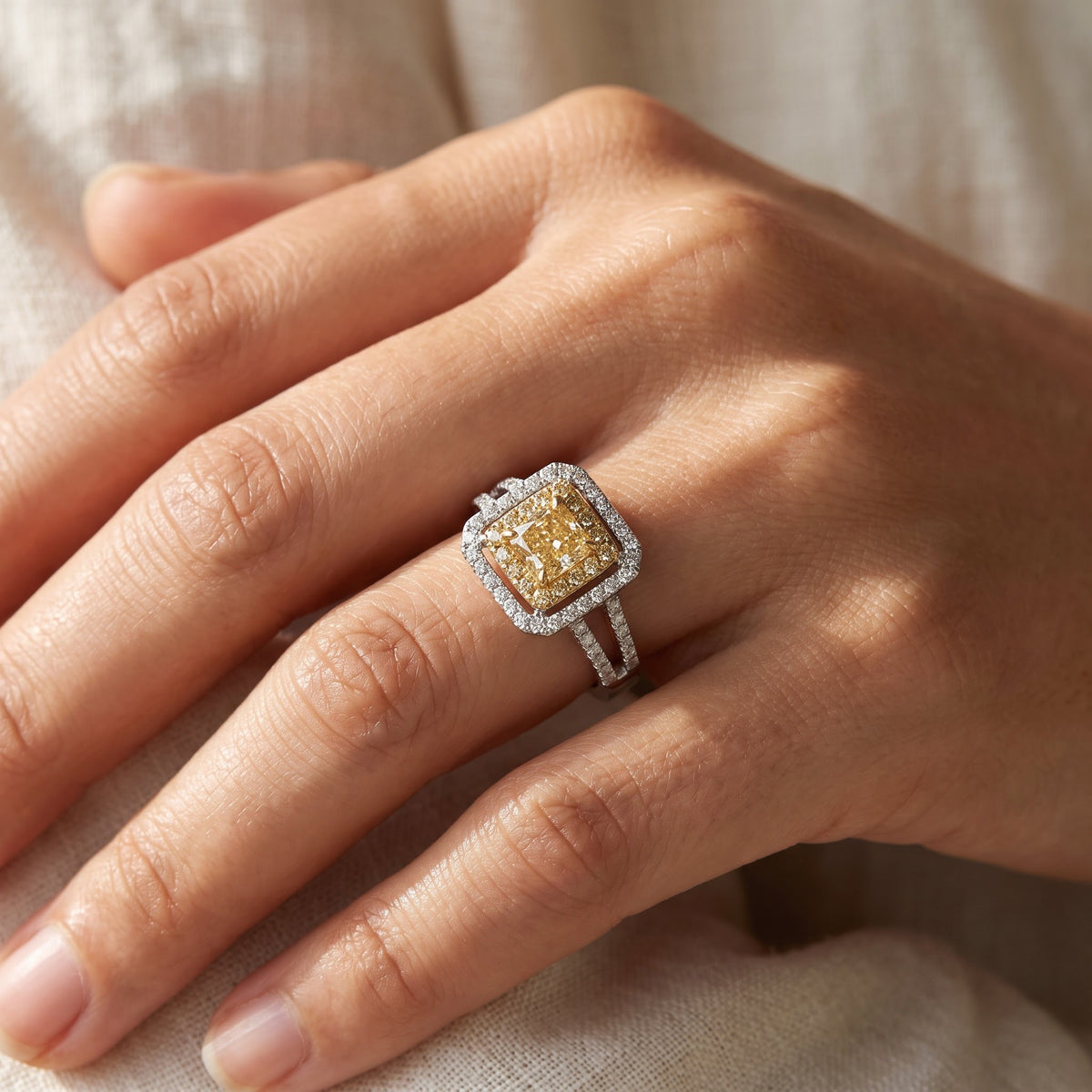 Fancy Yellow Diamond Double Halo Engagement Ring in White and Yellow Gold, worn