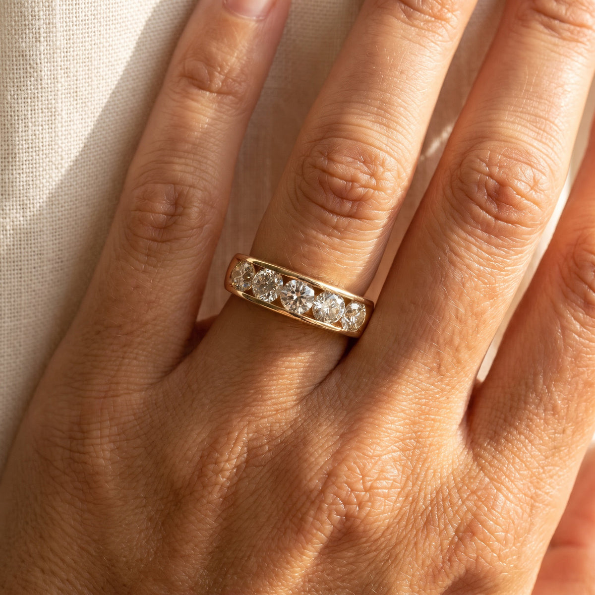 Five-Stone Diamond Channel Set Band Ring in 14K Yellow Gold, worn