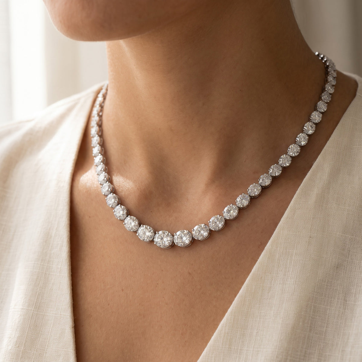 Graduated Diamond Cluster Tennis Necklace in 14K White Gold, worn