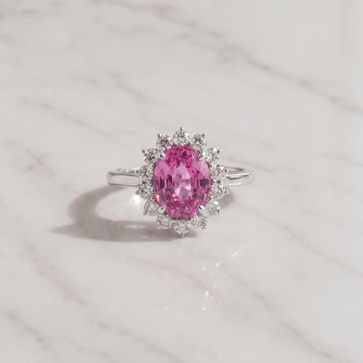 A pink-center halo ring on pale marble