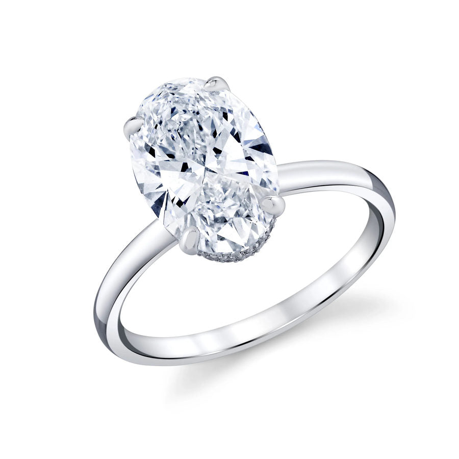 Oval diamond solitaire ring with a hidden halo and plain band