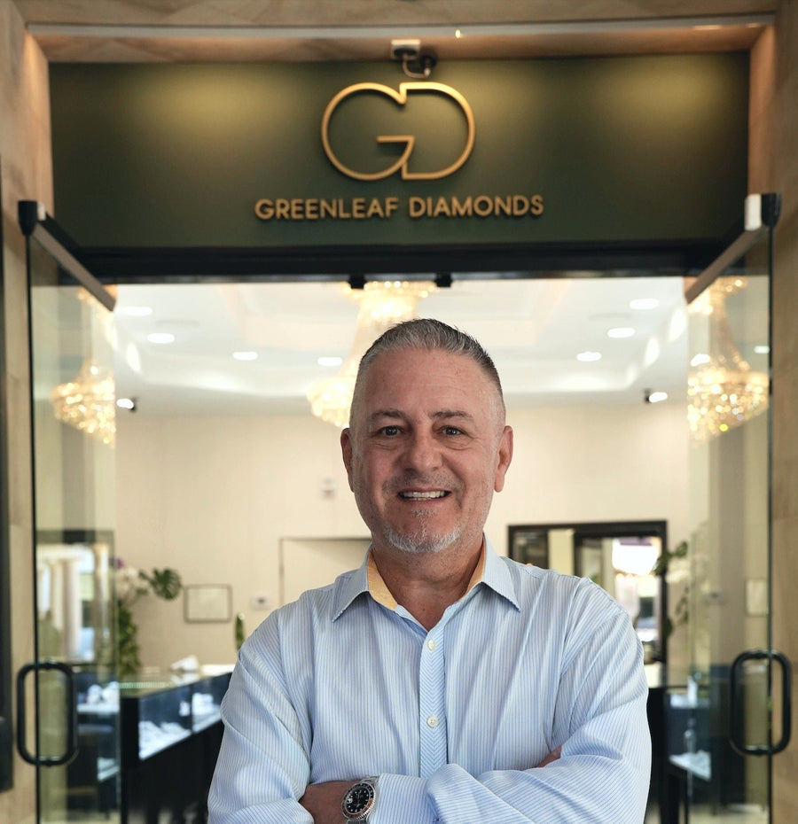 A member of the Greenleaf team at the door of the shop at the Shops at Wailea