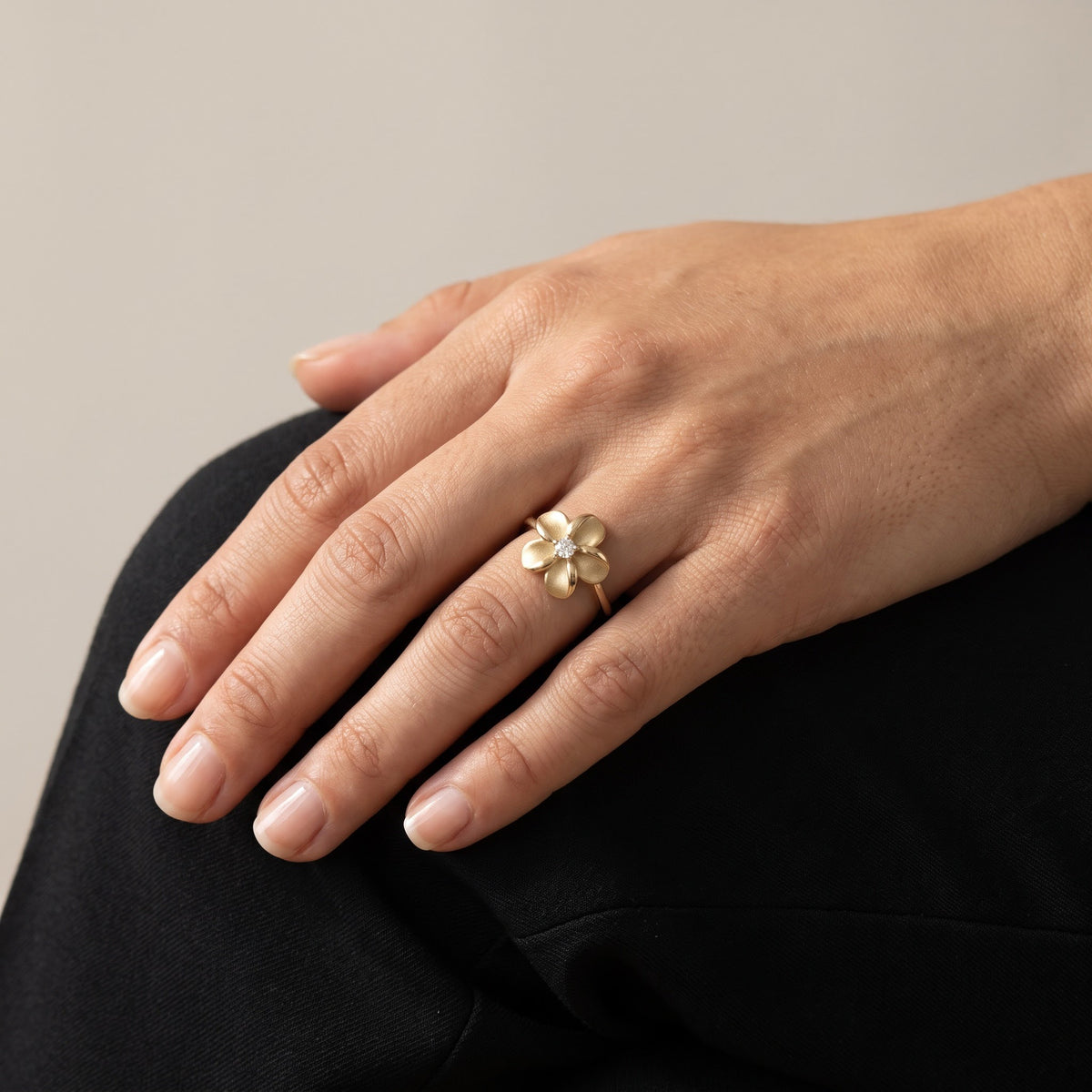 Matte Yellow Gold Plumeria Diamond Solitaire Ring, worn, second view