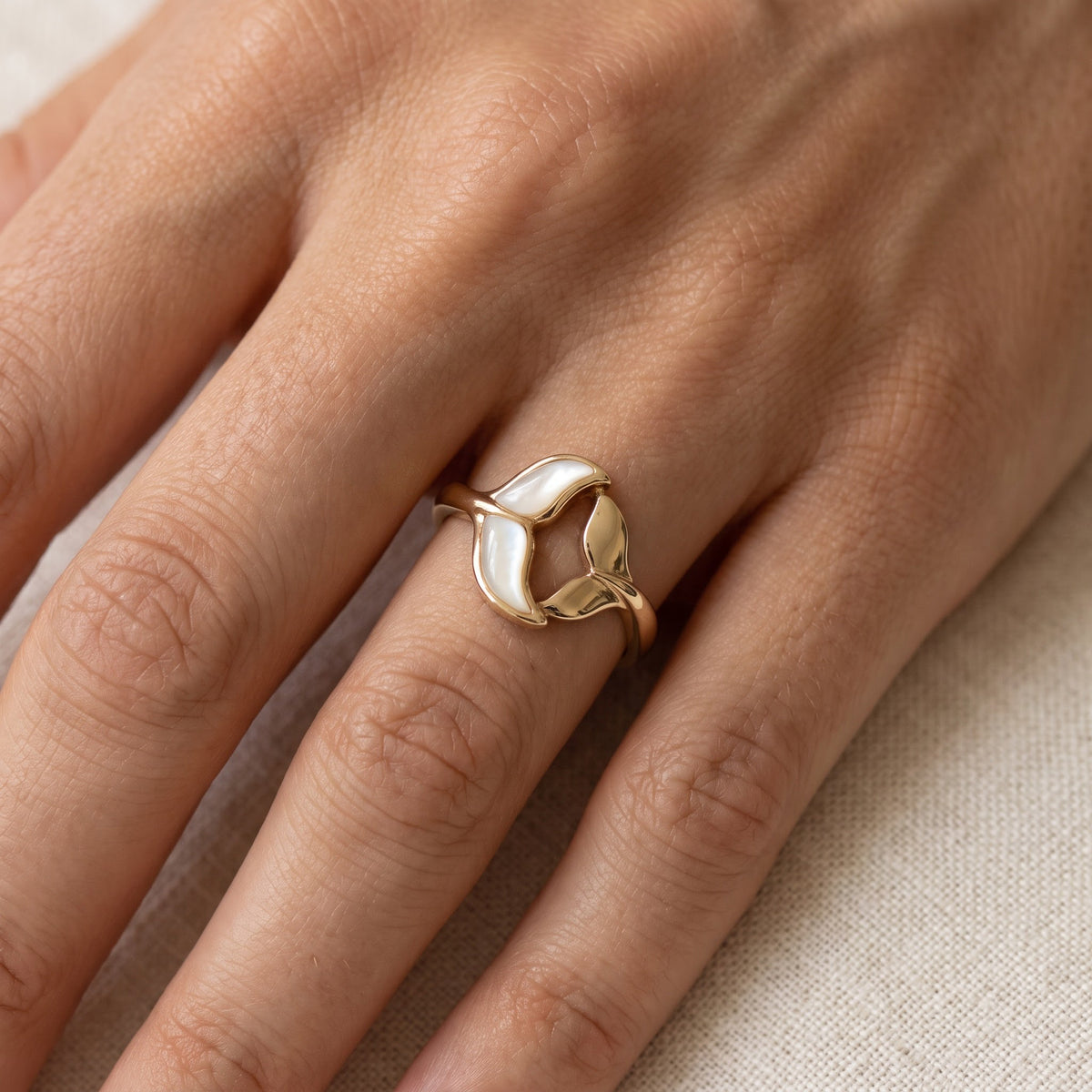 Mother-of-Pearl and Yellow Gold Whale Tail Ring, worn