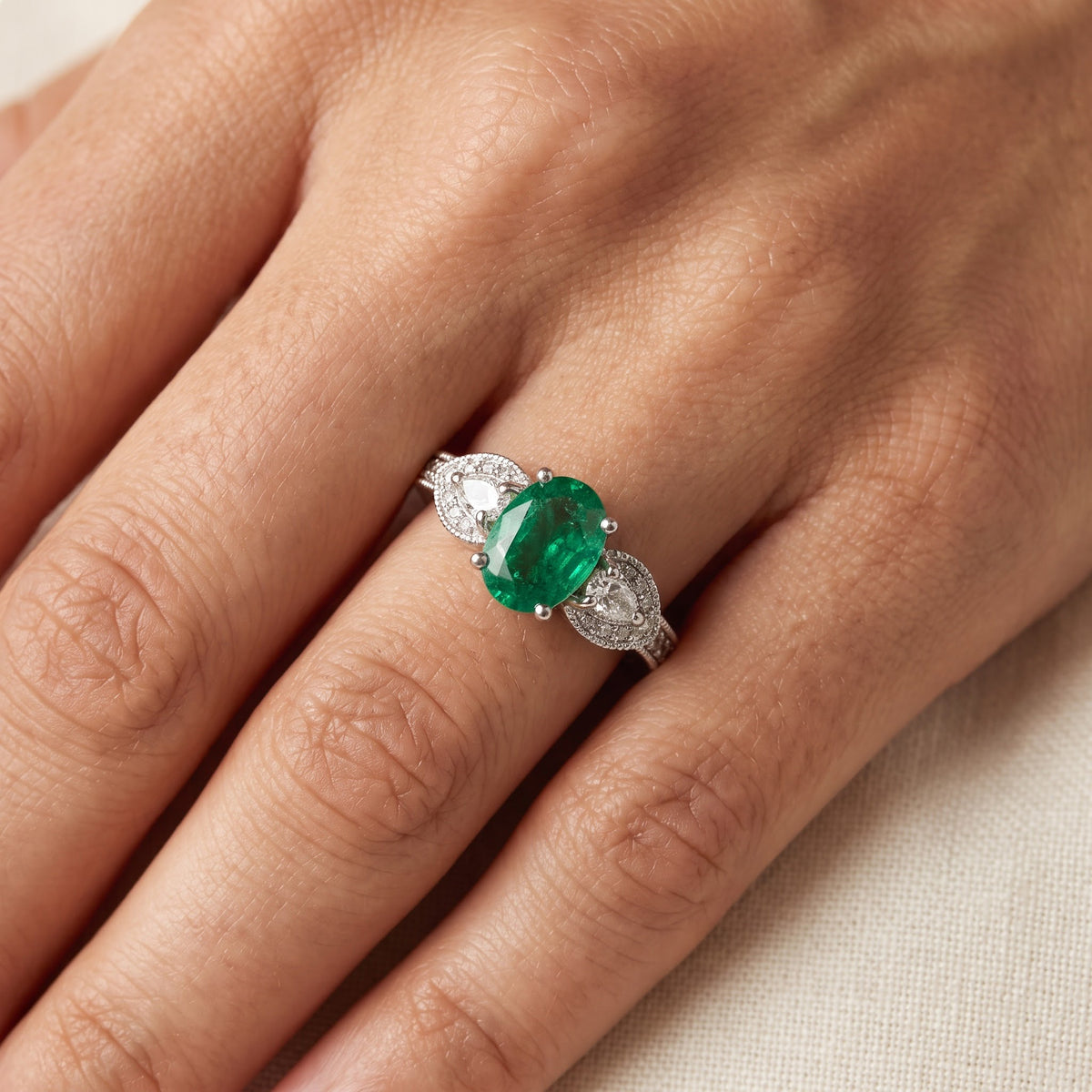 Oval Emerald and Diamond Ring in White Gold, worn