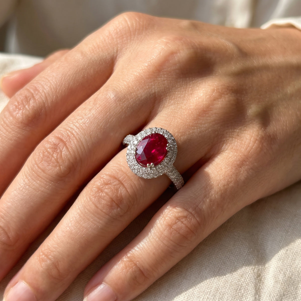 Oval Red Ruby Double Halo Cocktail Ring in White Gold, worn