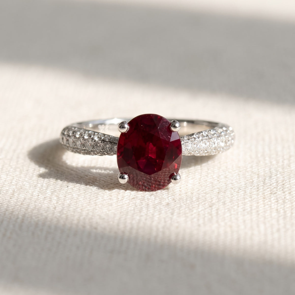 Oval Ruby Solitaire Ring with Diamond Pavé Band in White Gold