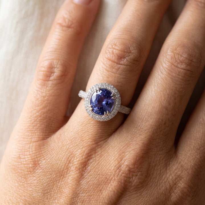 2.03 ct Oval Tanzanite and Diamond Pavé Halo Cocktail Ring in 14K White Gold, worn