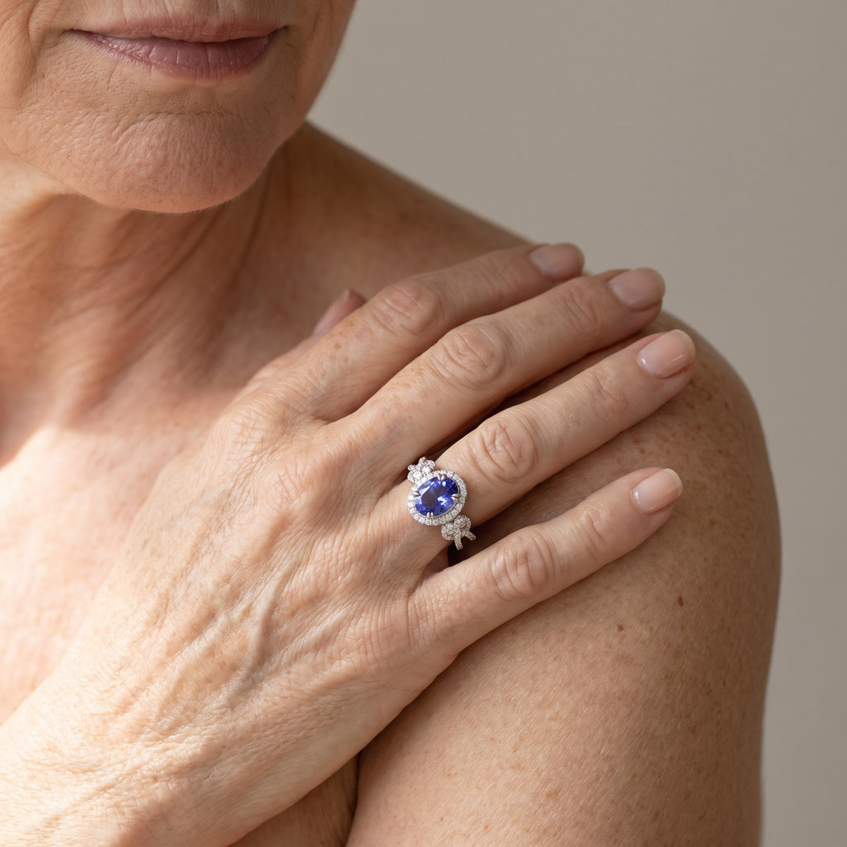Oval Tanzanite Halo Cocktail Ring in White Gold, worn
