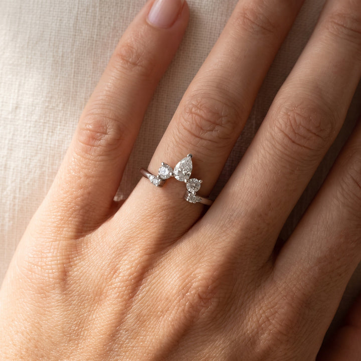 0.62 ct Pear and Round Diamond Curved Guard Ring in 14K White Gold, worn