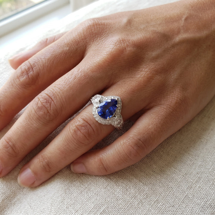 2.15 ct Pear-Cut Tanzanite and Diamond Halo Cocktail Ring in 14K White Gold, worn