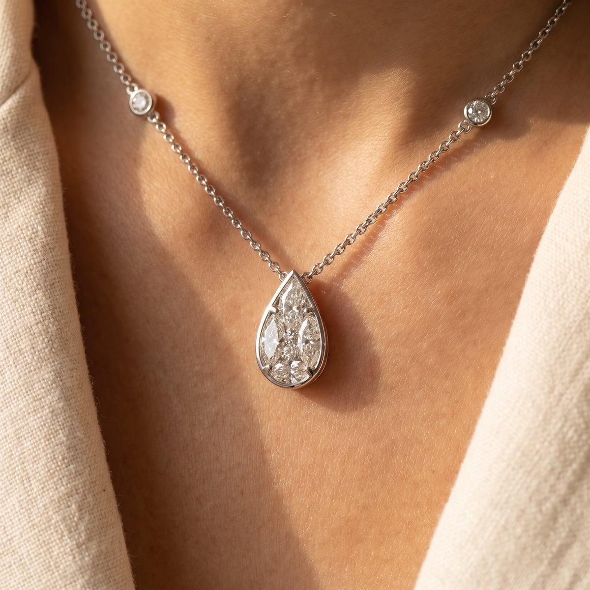 Pear-Shaped Diamond Cluster Pendant Necklace in White Gold, worn