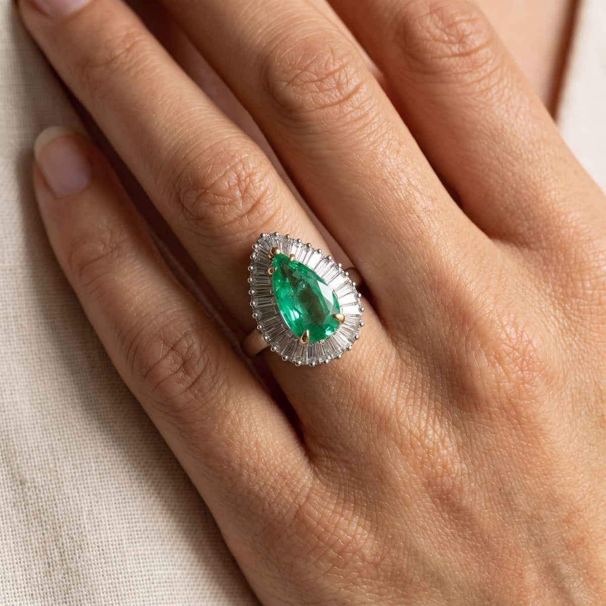 Pear-Shaped Emerald Ballerina Cocktail Ring in White Gold, worn