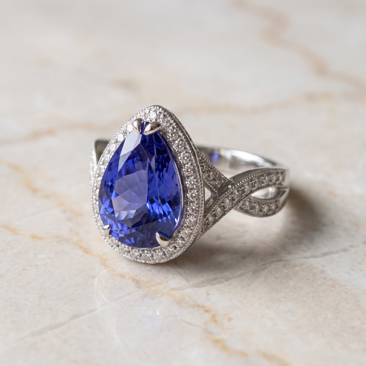 Pear-Shaped Tanzanite Halo Cocktail Ring in White Gold