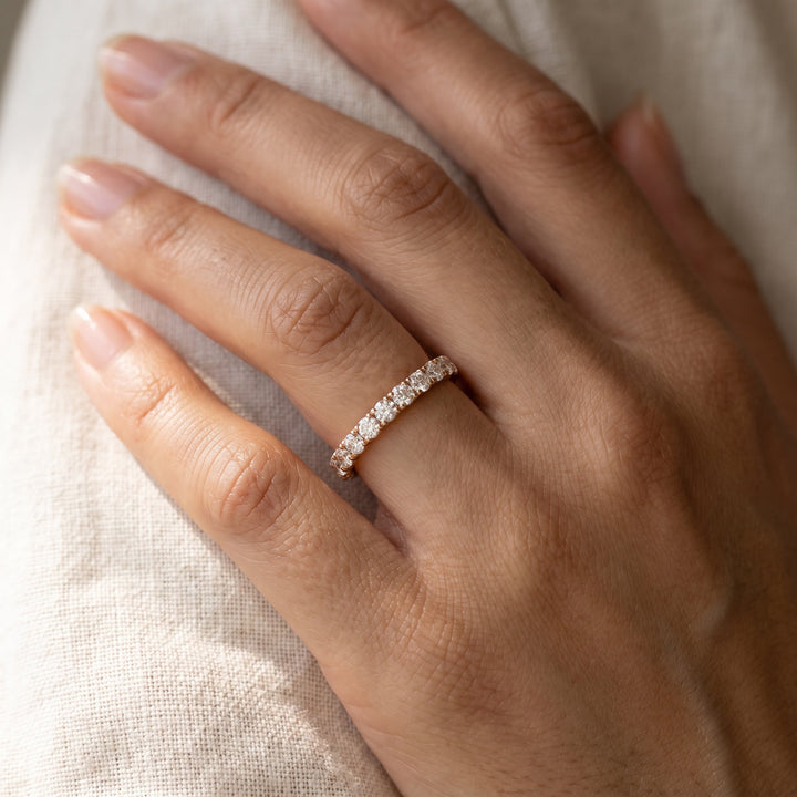 Petite Round Diamond Eternity Ring in Rose Gold, worn