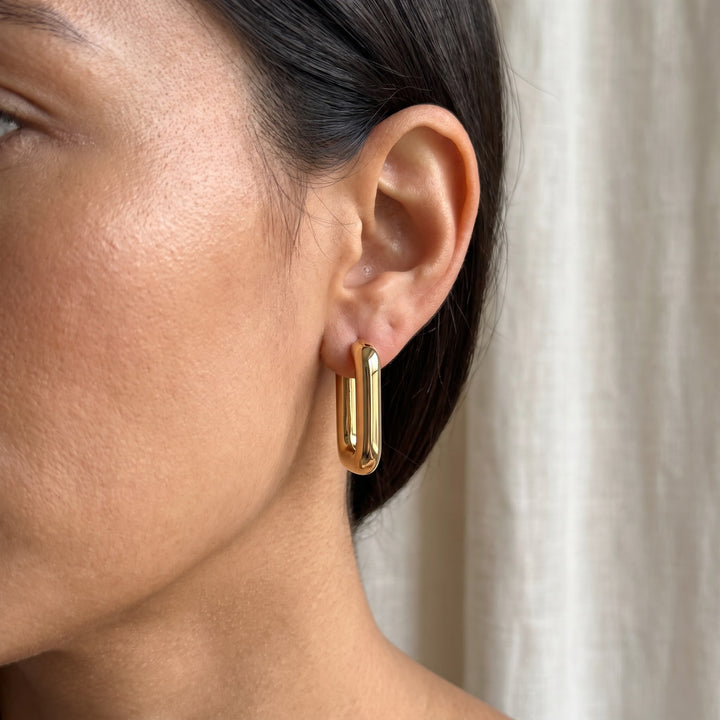 Polished Rectangular Hoop Earrings in 14K Yellow Gold, worn
