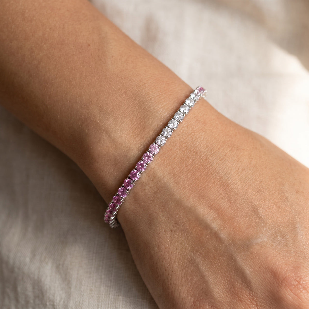 Purplish Pink Sapphire White Gold Tennis Bracelet, worn