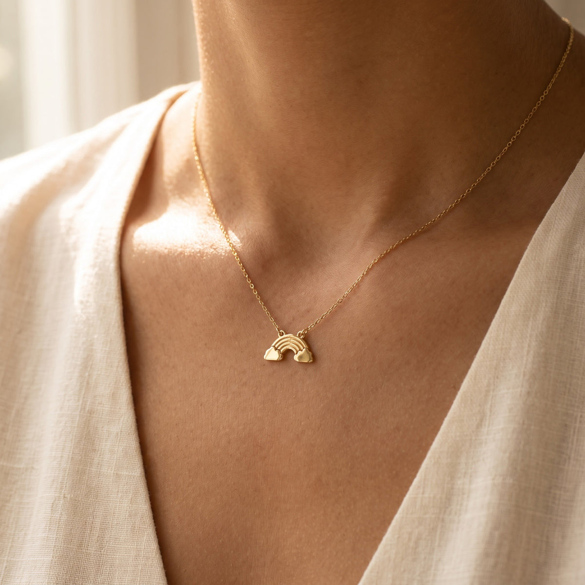 Rainbow Cloud Charm Necklace in Yellow Gold, worn