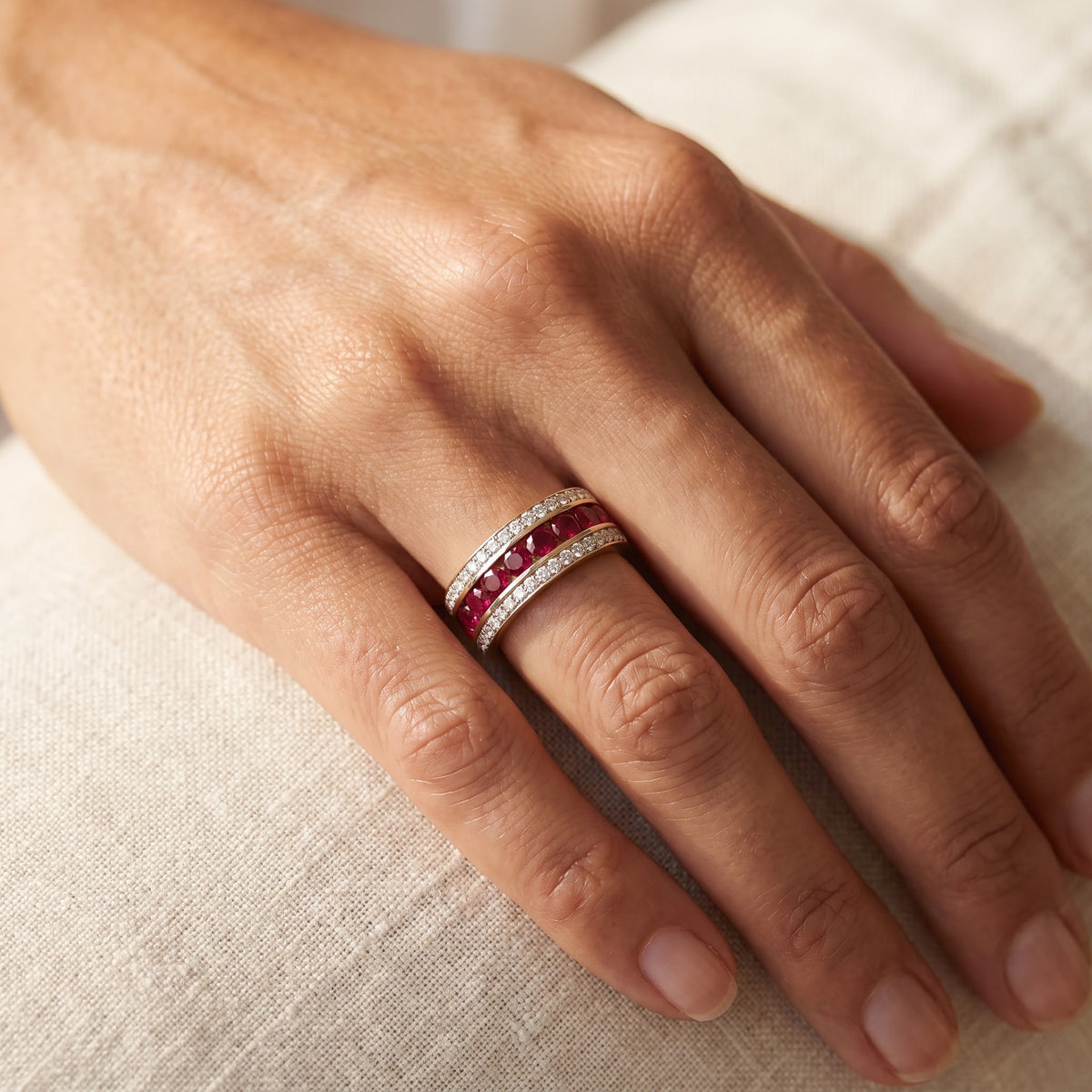 Red Ruby and Diamond Band Ring in Yellow Gold, worn