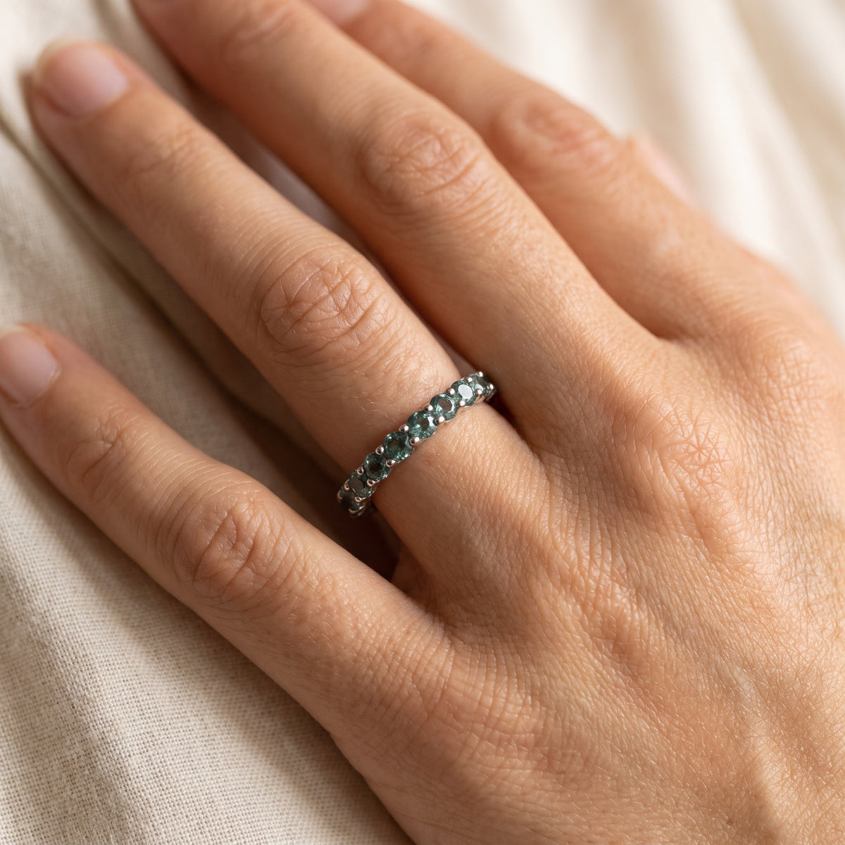 Round Alexandrite White Gold Eternity Band, worn