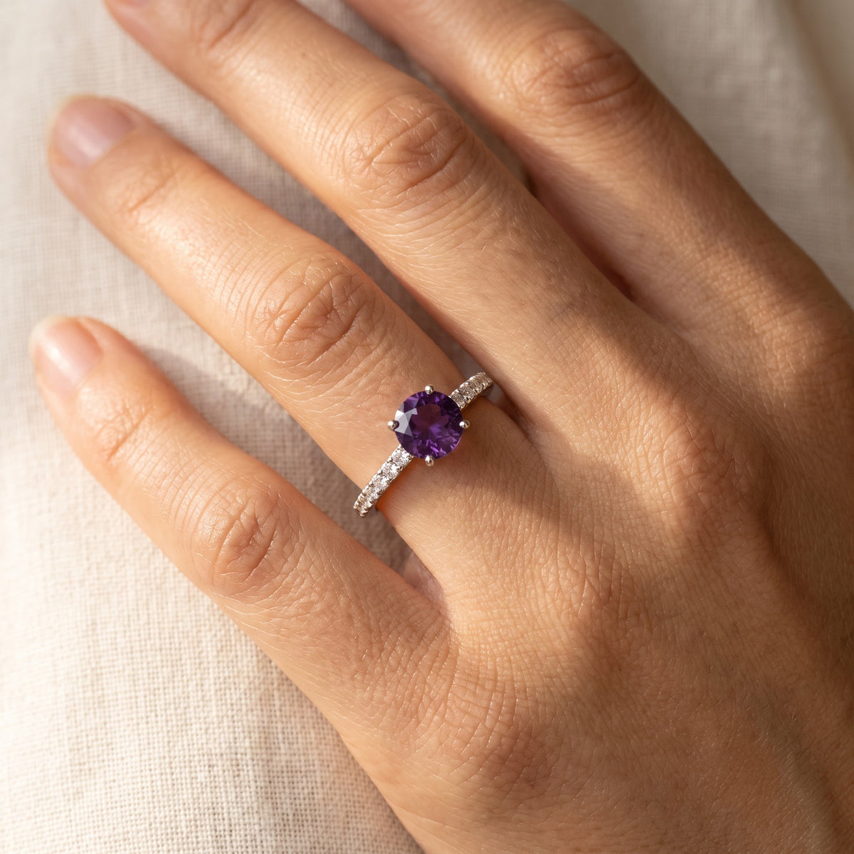 Round Amethyst Solitaire Ring in White Gold, worn