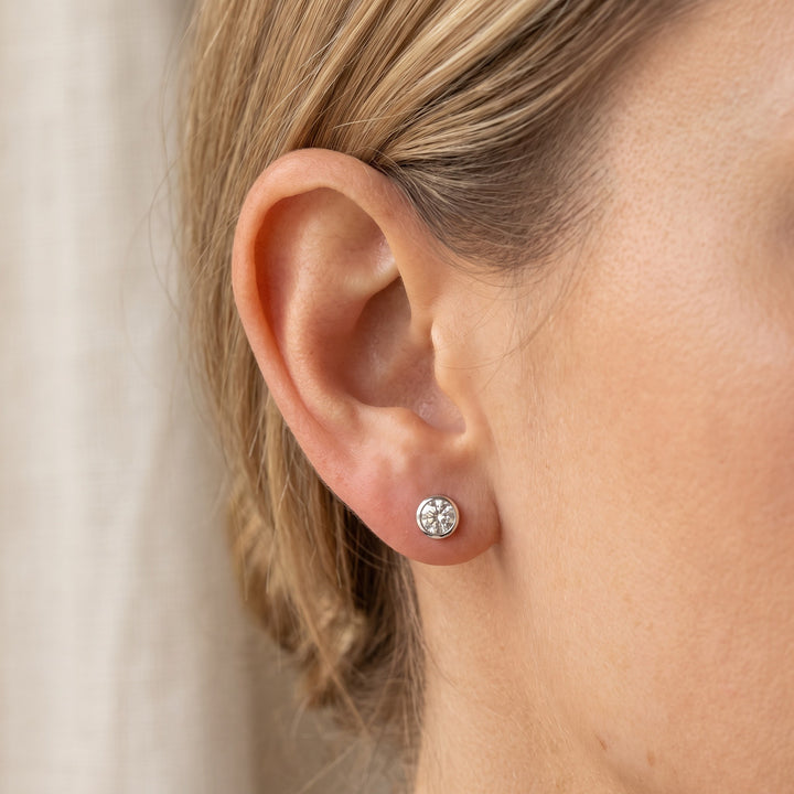 1.02 ct Round Brilliant Cut Diamond Bezel Stud Earrings in Platinum, worn