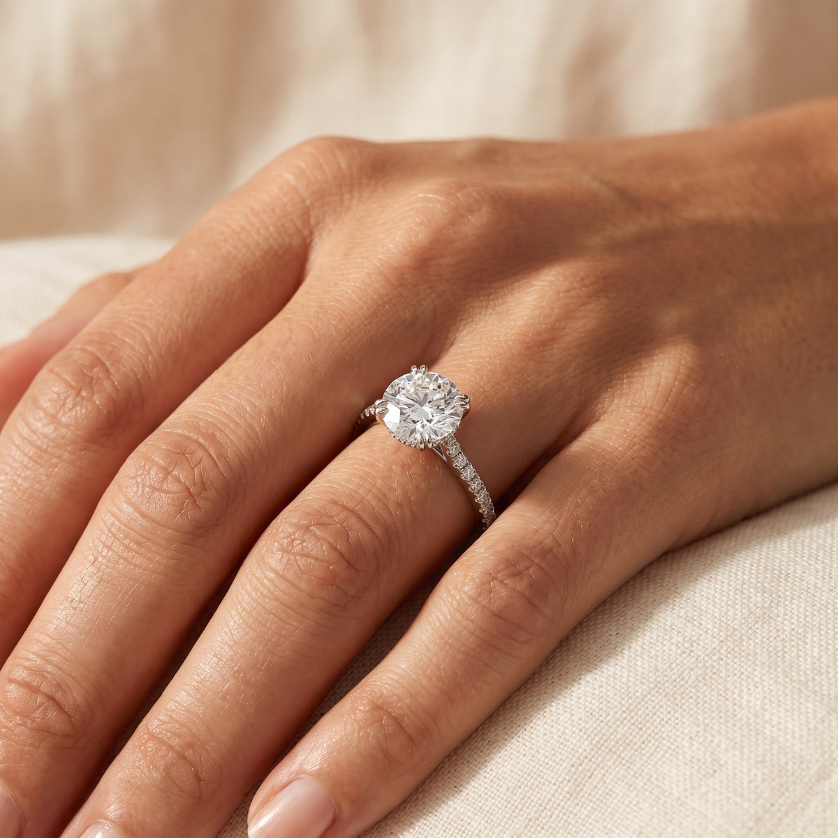Round Brilliant Diamond Pavé Engagement Ring in White Gold, worn