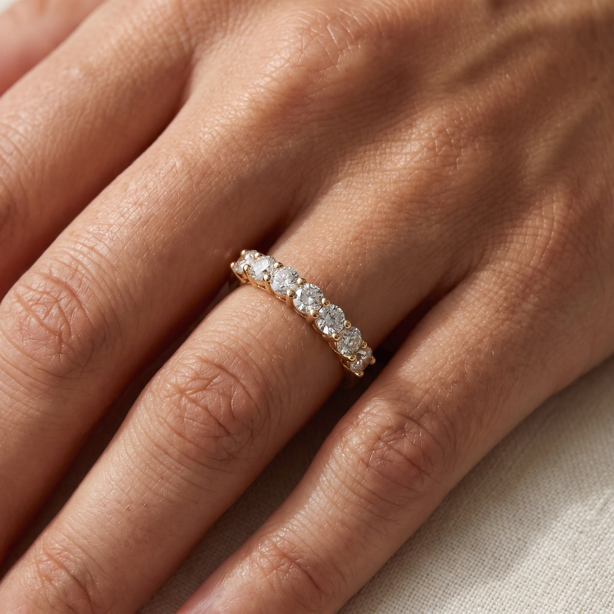 Round Diamond Half-Eternity Band in Yellow Gold, worn