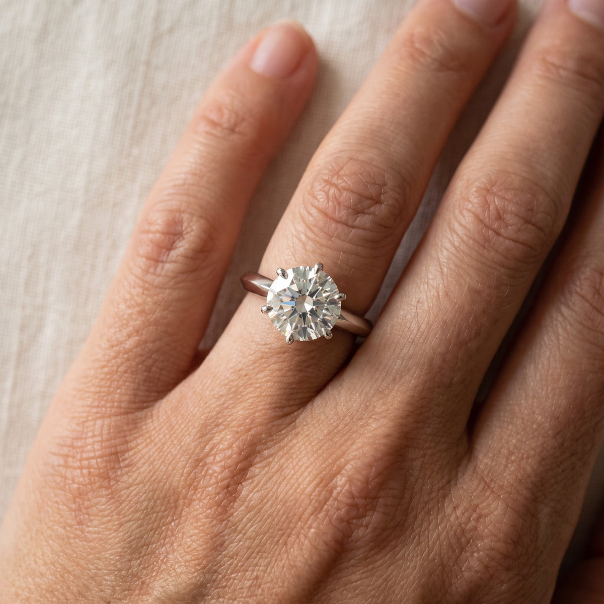 Round Diamond Six-Prong Solitaire Ring in Platinum, worn