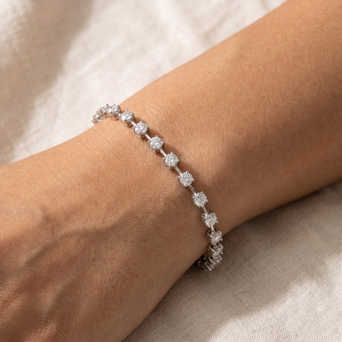 Round Diamond Station Tennis Bracelet in White Gold, worn