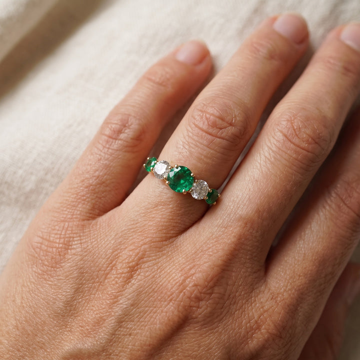 1.05 ct Round Emerald and Diamond Five-Stone Ring in 18K Yellow Gold, worn
