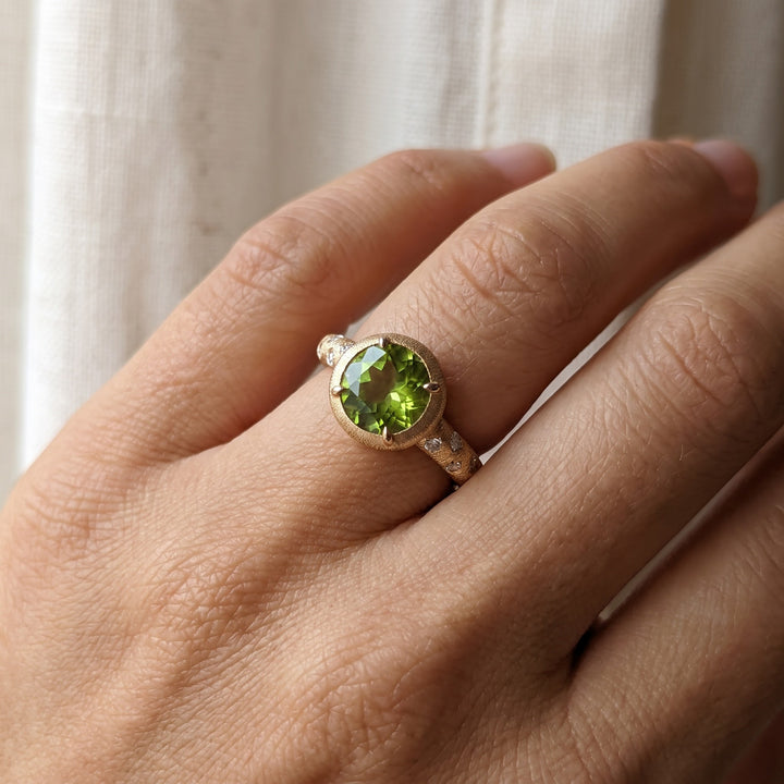 1.58 ct Round Peridot and Diamond Ring in Textured 14K Rose Gold, worn