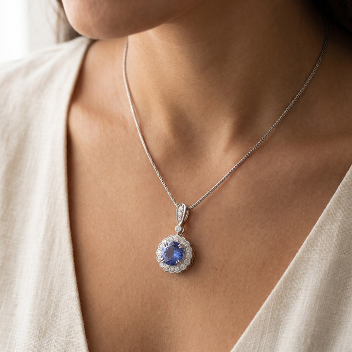 2.24 ct Round Tanzanite and Diamond Halo Pendant Necklace in 14K White Gold, worn