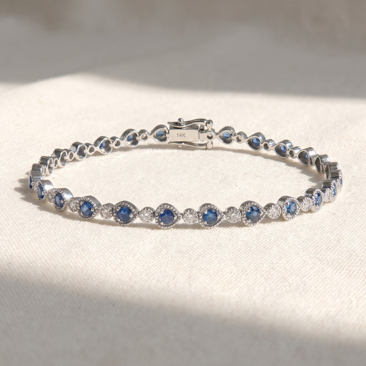 1.50 ct Royal Blue Sapphire and Diamond Tennis Bracelet in 14K White Gold
