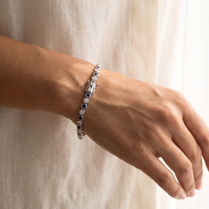 1.42 ct Royal Blue Sapphire and Diamond Bezel Tennis Bracelet in 14K White Gold, worn