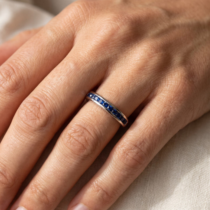 0.50 ct Royal Blue Sapphire Channel-Set Band in 14K White Gold, worn