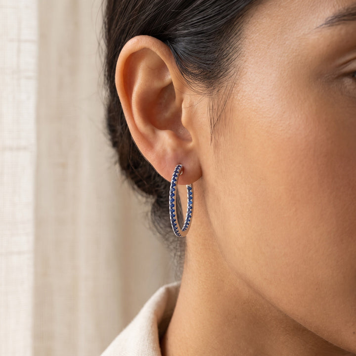 0.31 ct Royal Blue Sapphire Line Hoop Earrings with Diamond Accents in 14K White Gold, worn