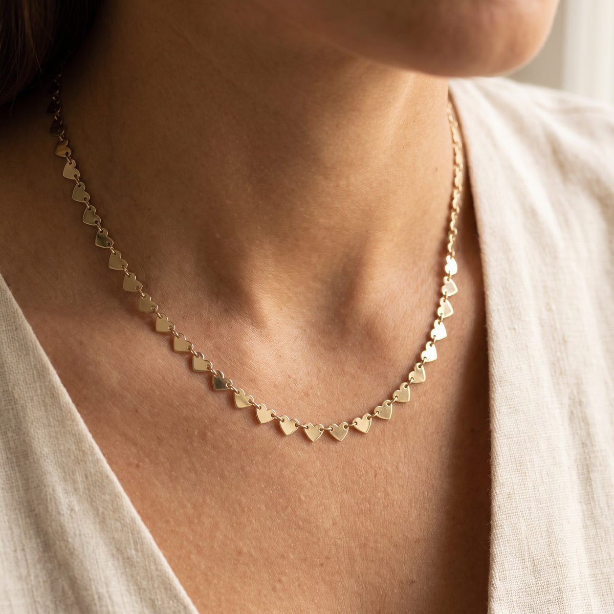 Solid Yellow Gold Continuous Heart Link Necklace, worn