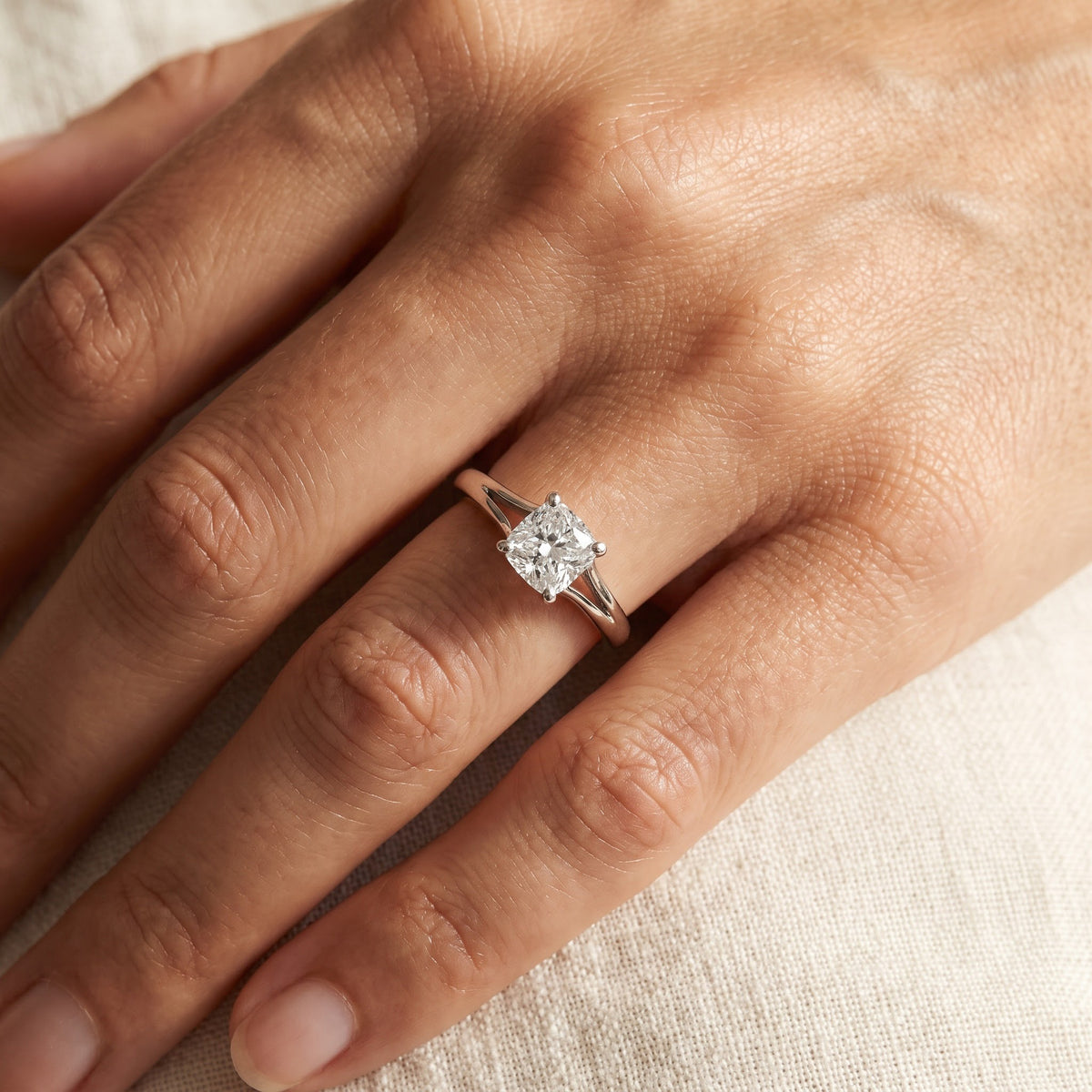 Split Shank Diamond Solitaire Ring in White Gold, worn