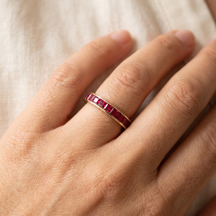 3.90 ct Square-Cut Ruby Eternity Ring in 14K Yellow Gold, worn