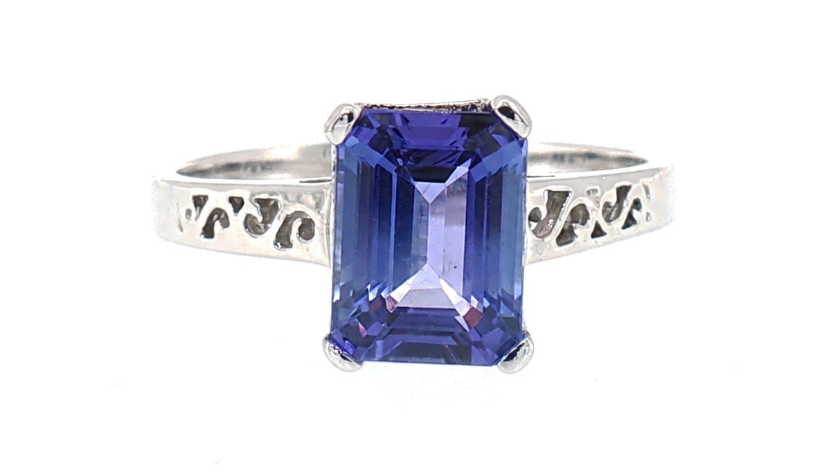 Tanzanite Solitaire Ring with Cut-Out White Gold Band