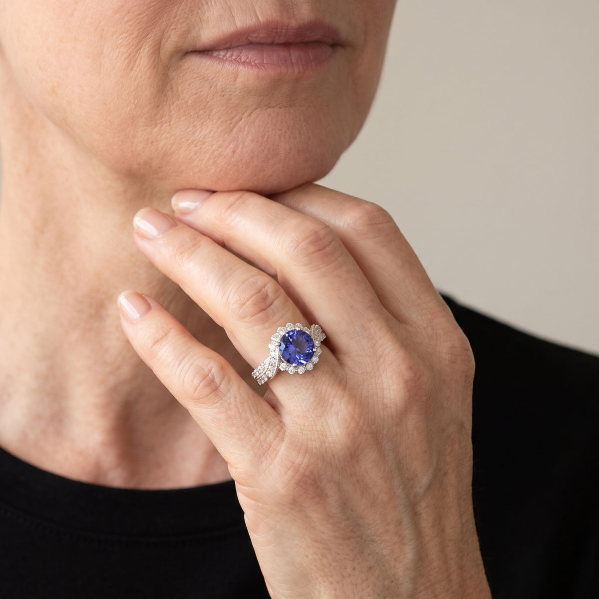 Tanzanite Twist Halo Cocktail Ring in White Gold, worn