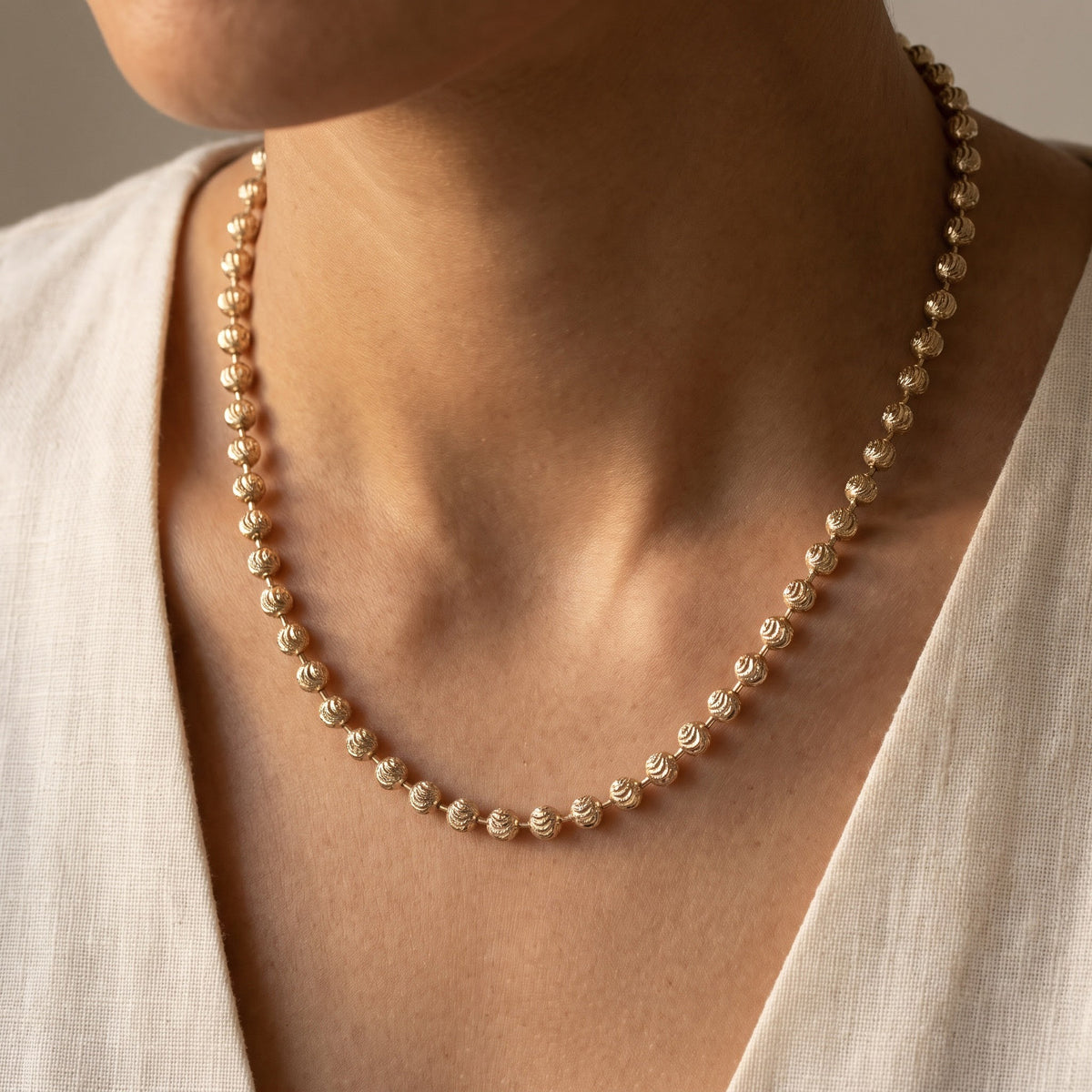 Textured Beaded Chain Necklace in Yellow Gold, worn