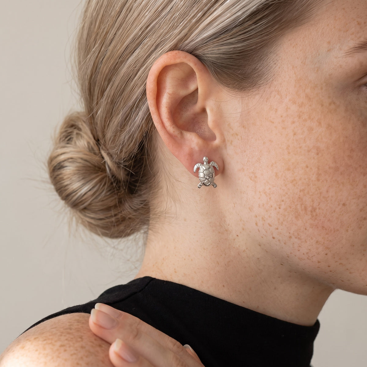 Textured Sea Turtle Stud Earrings in White Gold, worn, second view