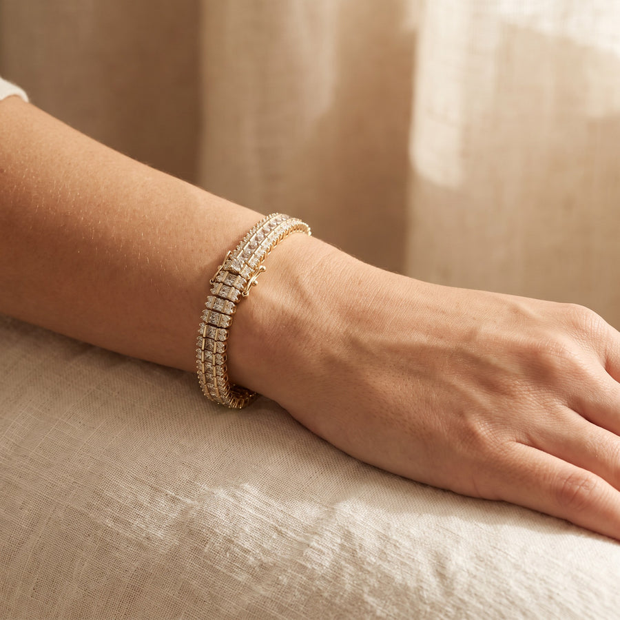 Three-row tennis bracelet in yellow gold, worn