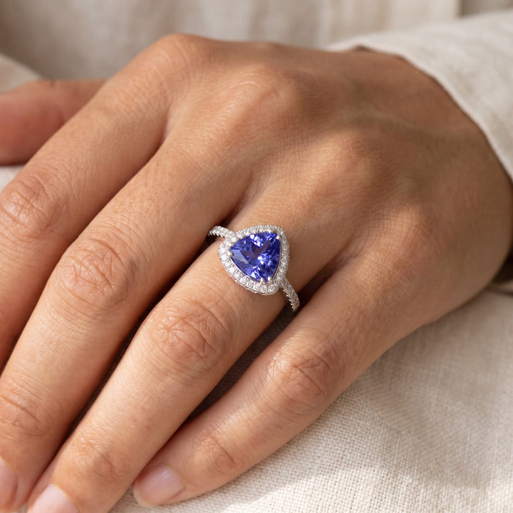 1.64 ct Trillion-Cut Tanzanite and Diamond Halo Cocktail Ring in 14K White Gold, worn